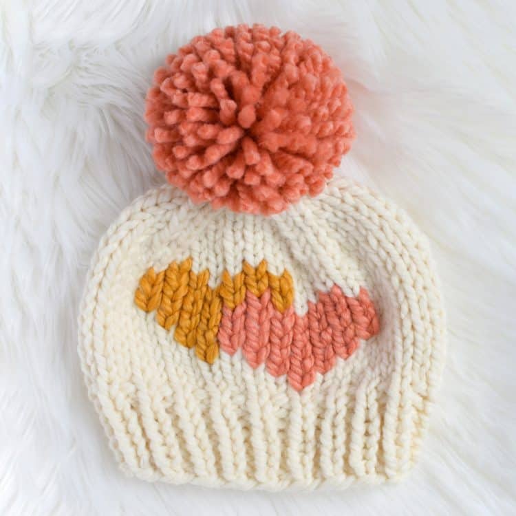 Duplicate Stitch Heart Tutorial - how to add a duplicate stitch heart to your knits! Free graph and video tutorial from www.kniftyknittings.com #knitting #knittingtutorial #valentinesknits